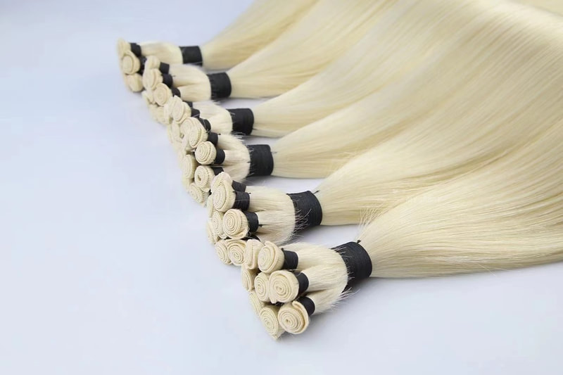 Hand tied weft hair extensions